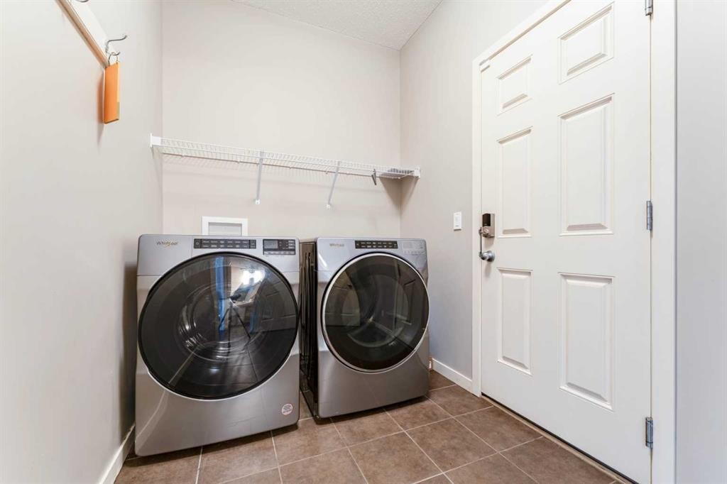 292 Auburn Bay Drive Se, Calgary, AB - Indoor Photo Showing Laundry Room