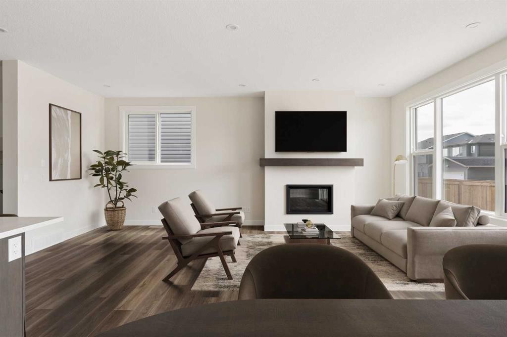 120 Creekstone Circle Sw, Calgary, AB - Indoor Photo Showing Living Room With Fireplace