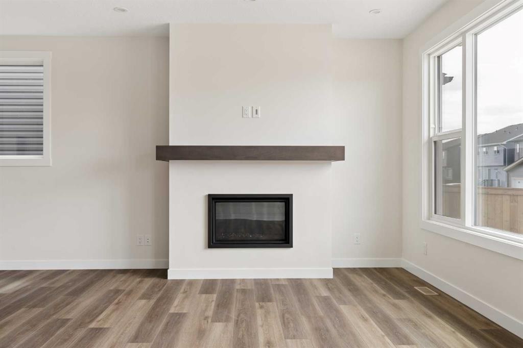 120 Creekstone Circle Sw, Calgary, AB - Indoor Photo Showing Living Room With Fireplace