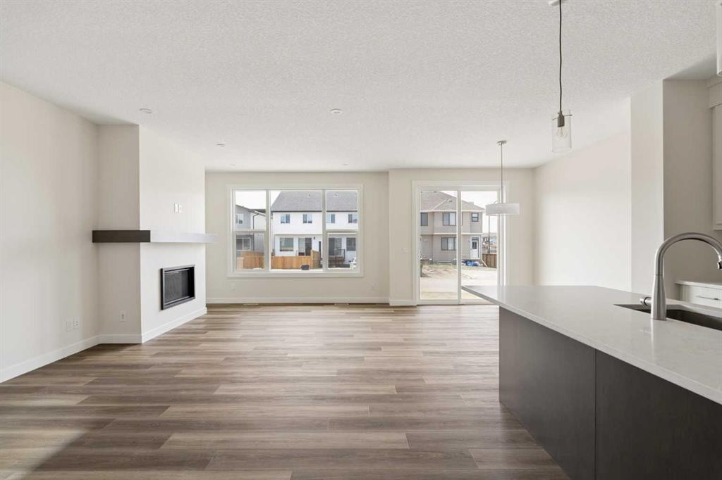 120 Creekstone Circle Sw, Calgary, AB - Indoor With Fireplace