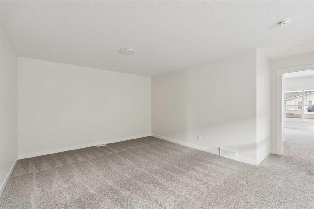 120 Creekstone Circle Sw, Calgary, AB - Indoor Photo Showing Other Room