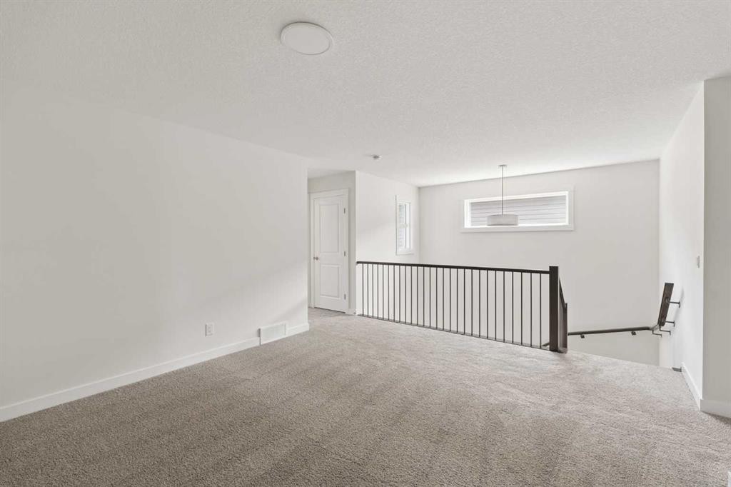 120 Creekstone Circle Sw, Calgary, AB - Indoor Photo Showing Other Room