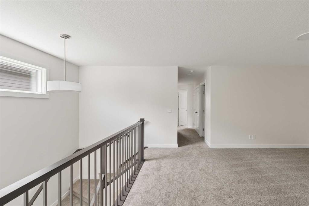 120 Creekstone Circle Sw, Calgary, AB - Indoor Photo Showing Other Room