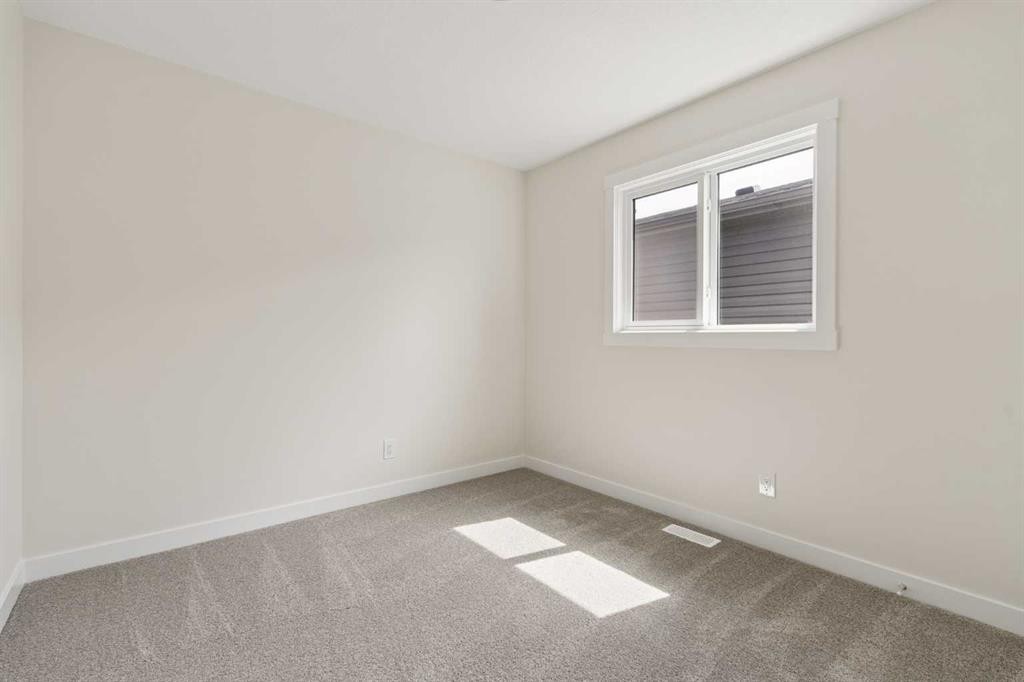 120 Creekstone Circle Sw, Calgary, AB - Indoor Photo Showing Other Room
