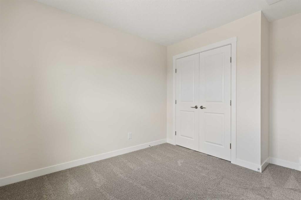 120 Creekstone Circle Sw, Calgary, AB - Indoor Photo Showing Other Room