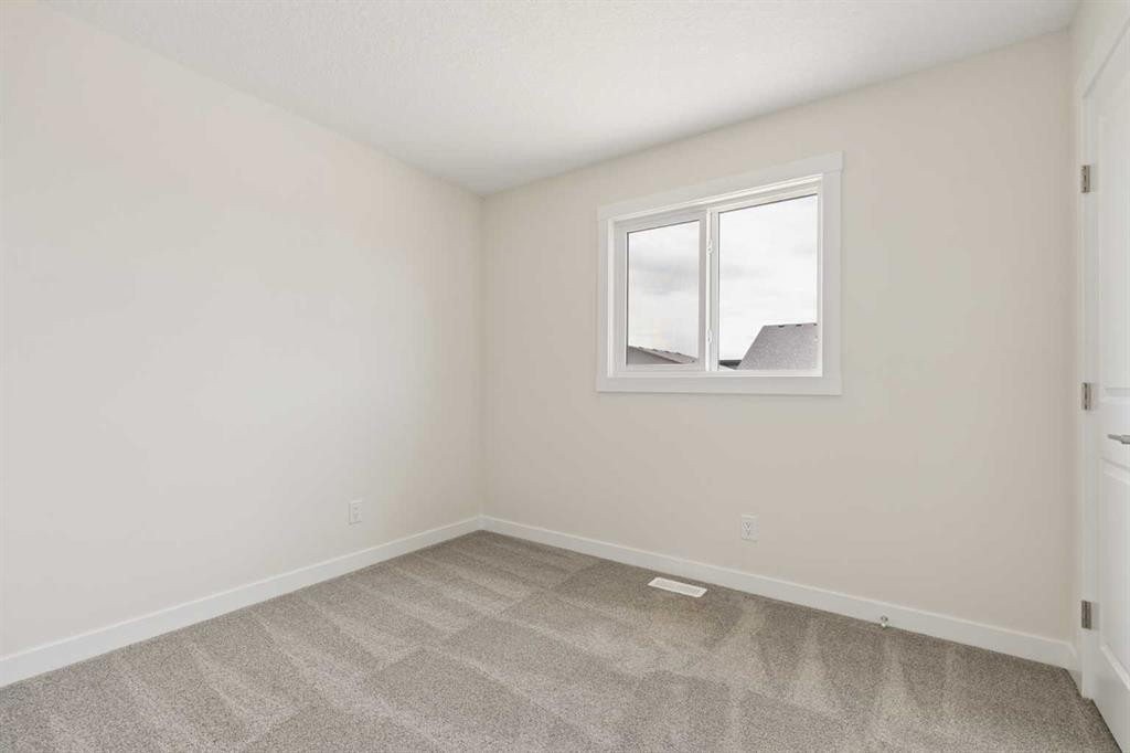 120 Creekstone Circle Sw, Calgary, AB - Indoor Photo Showing Other Room