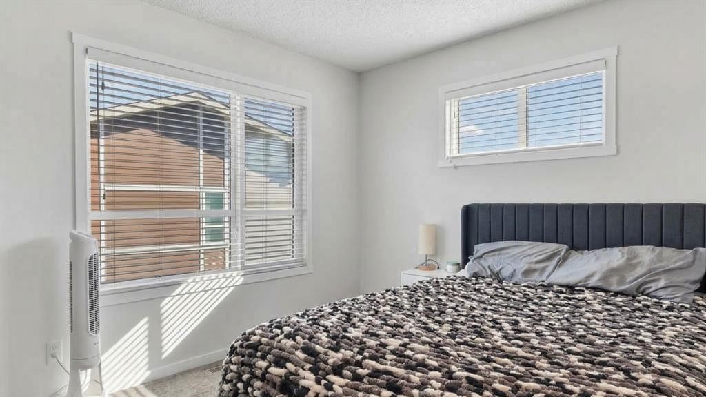 220 Harvest Grove Walk Ne, Calgary, AB - Indoor Photo Showing Bedroom