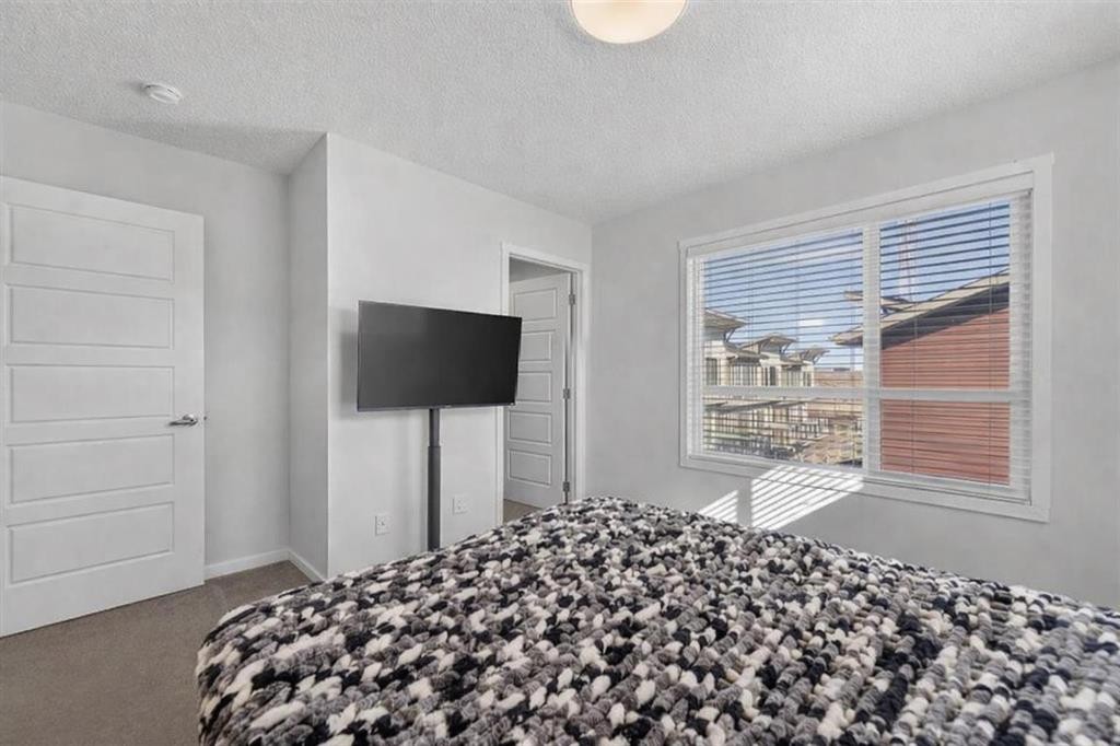 220 Harvest Grove Walk Ne, Calgary, AB - Indoor Photo Showing Bedroom