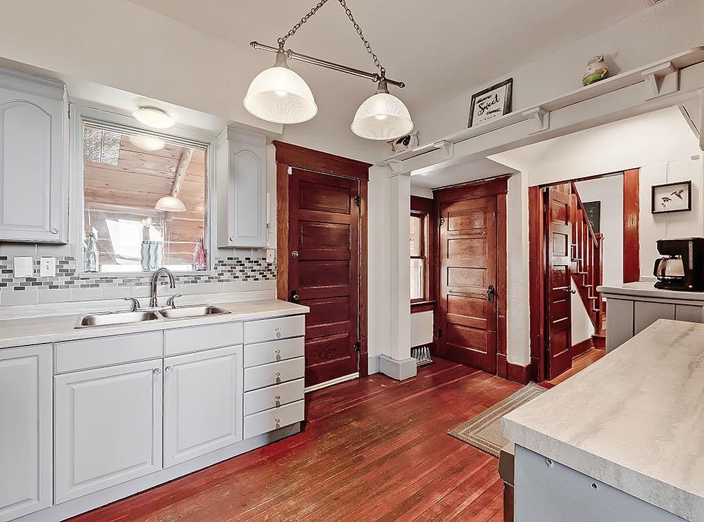 5136 54 Avenue, Stavely, AB - Indoor Photo Showing Kitchen With Double Sink