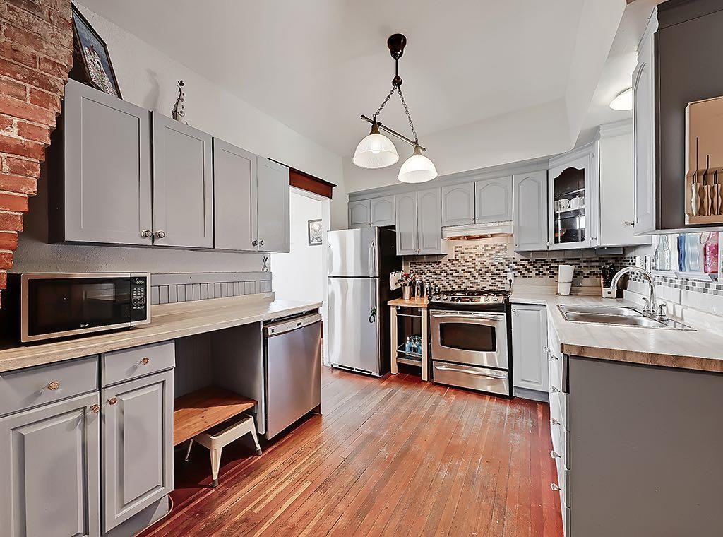 5136 54 Avenue, Stavely, AB - Indoor Photo Showing Kitchen With Double Sink