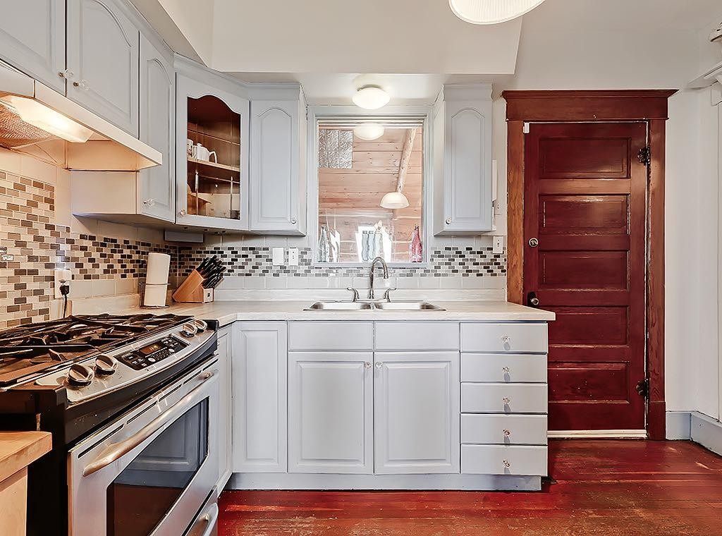 5136 54 Avenue, Stavely, AB - Indoor Photo Showing Kitchen With Double Sink