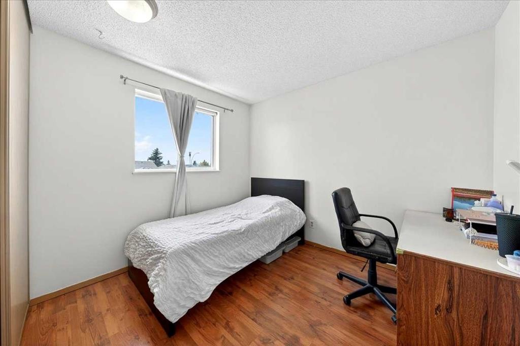 124 Martinwood Court Ne, Calgary, AB - Indoor Photo Showing Bedroom