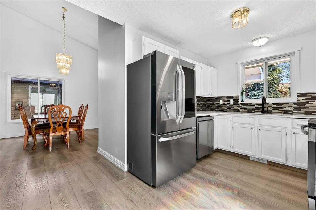 236 Mckerrell Way Se, Calgary, AB - Indoor Photo Showing Kitchen With Upgraded Kitchen