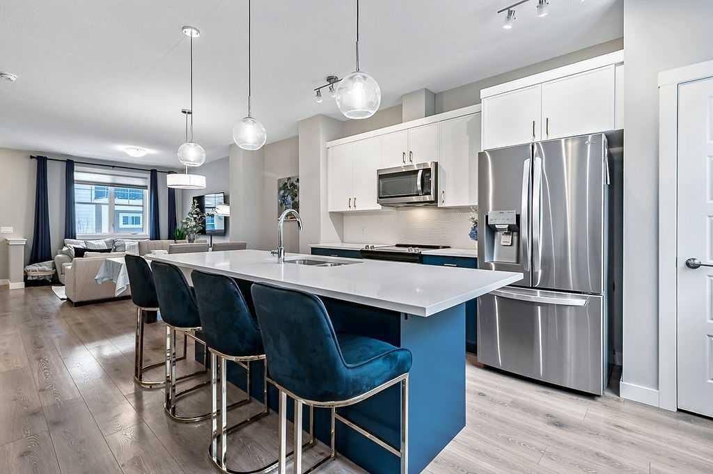 305 Cranbrook Walk Se, Calgary, AB - Indoor Photo Showing Kitchen With Upgraded Kitchen