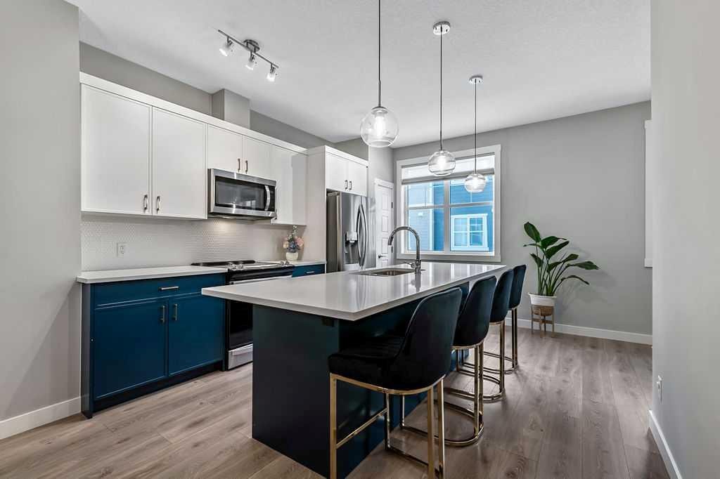 305 Cranbrook Walk Se, Calgary, AB - Indoor Photo Showing Kitchen With Upgraded Kitchen