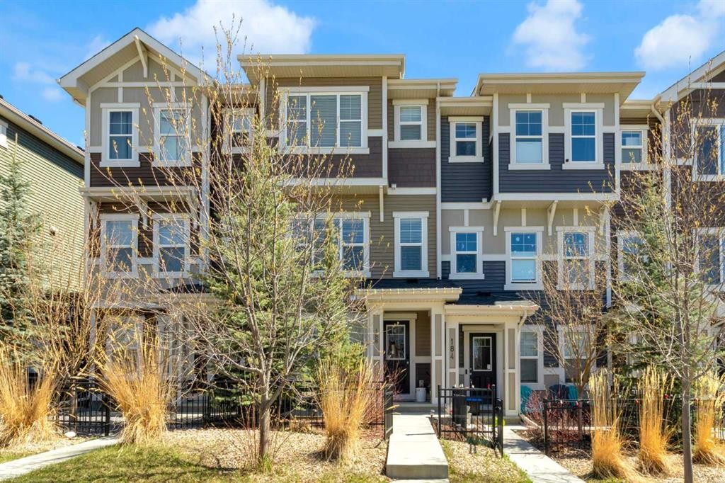188 Sundown Road, Cochrane, AB - Outdoor With Facade