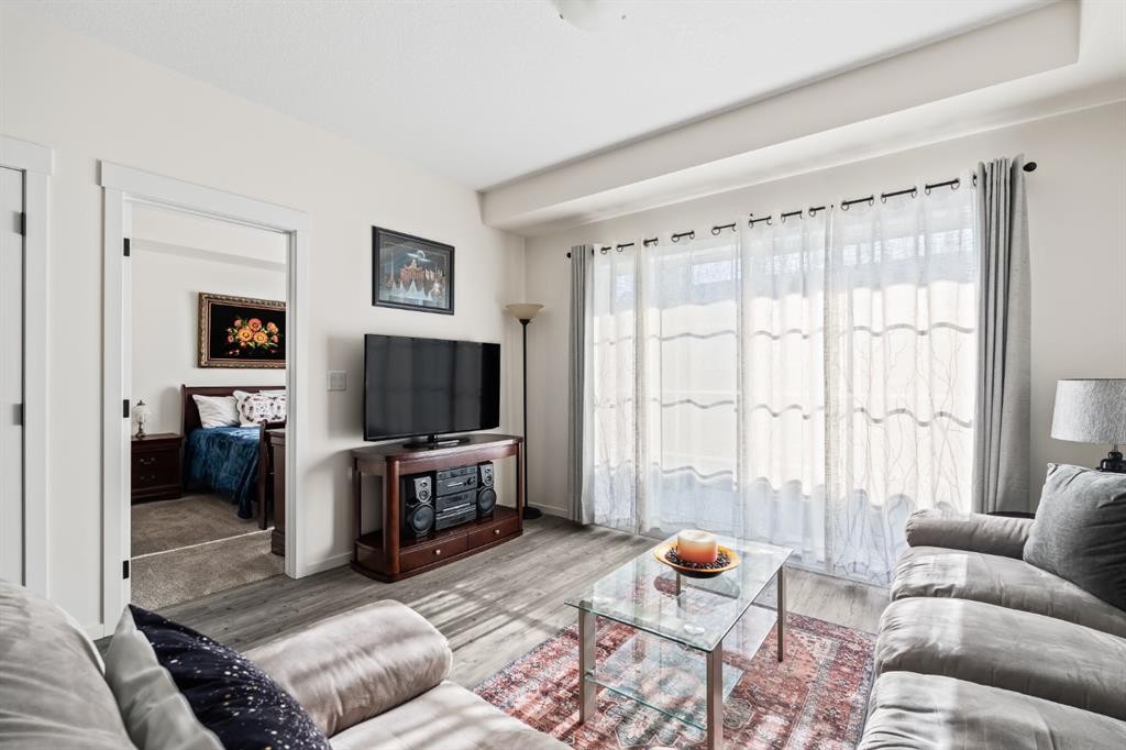 6302-151 Legacy Main Street Se, Calgary, AB - Indoor Photo Showing Living Room