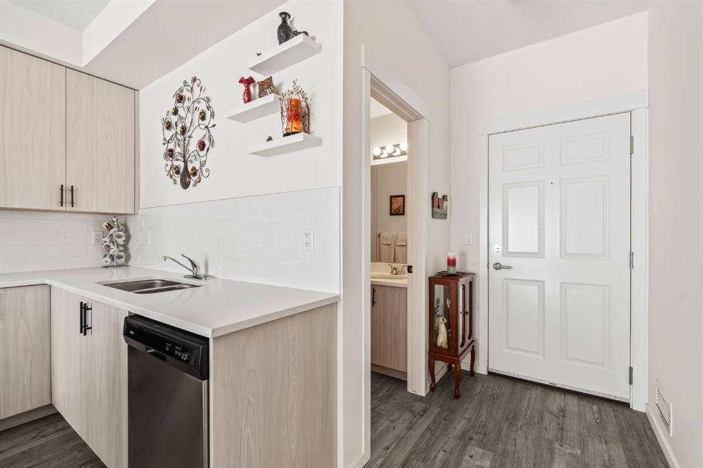 6302-151 Legacy Main Street Se, Calgary, AB - Indoor Photo Showing Kitchen With Double Sink