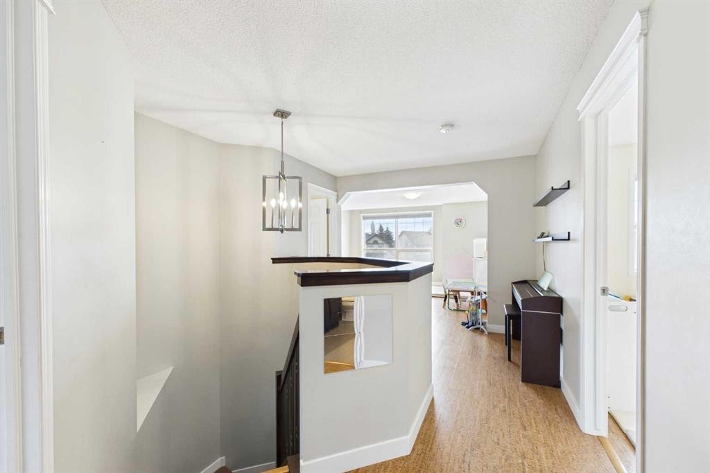 149 Tuscany Ravine Bay Nw, Calgary, AB - Indoor Photo Showing Other Room