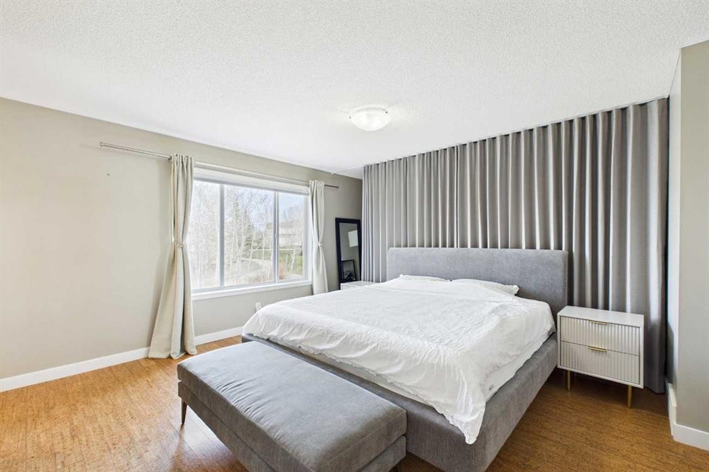 149 Tuscany Ravine Bay Nw, Calgary, AB - Indoor Photo Showing Bedroom