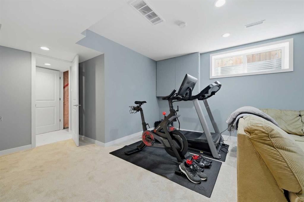 115 Everwoods Park Sw, Calgary, AB - Indoor Photo Showing Gym Room
