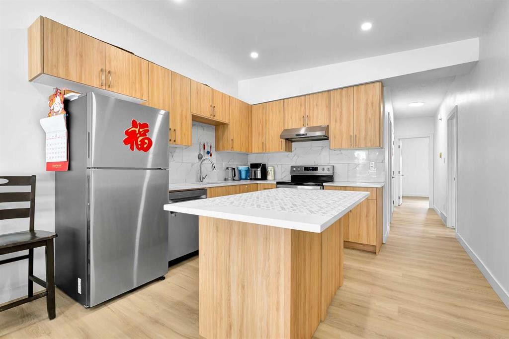 5023 North Haven Drive Nw, Calgary, AB - Indoor Photo Showing Kitchen With Stainless Steel Kitchen