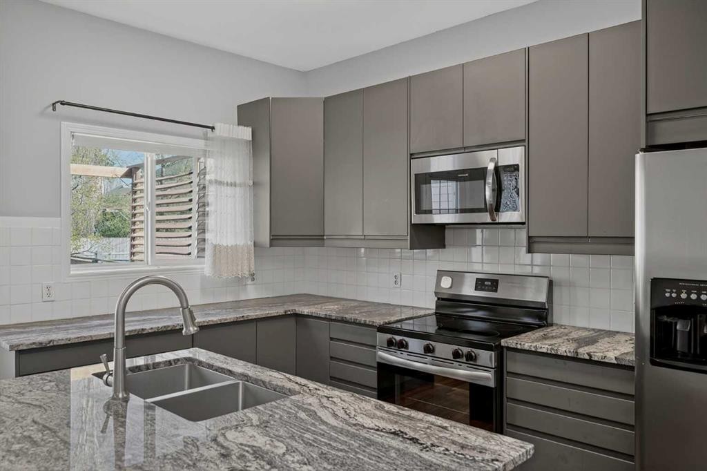 36 Chaparral Drive, Calgary, AB - Indoor Photo Showing Kitchen With Double Sink With Upgraded Kitchen