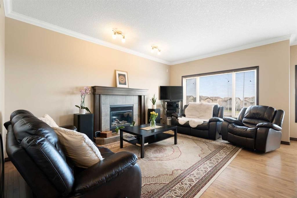 196 Nolanfield Way Nw, Calgary, AB - Indoor Photo Showing Living Room With Fireplace