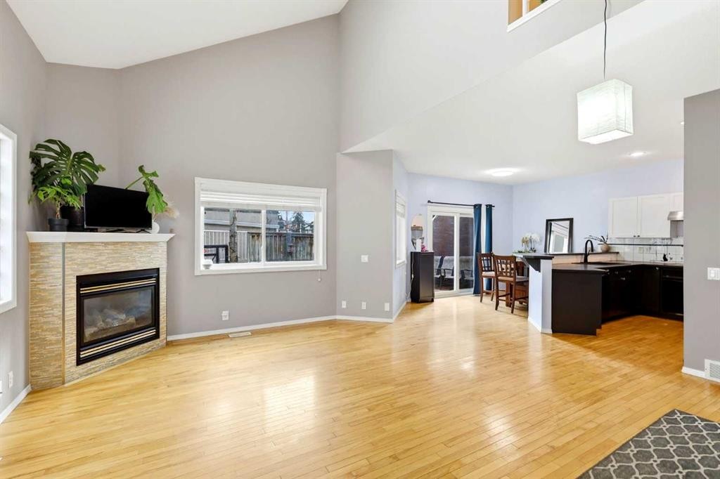 45 Patterson Hill Sw, Calgary, AB - Indoor Photo Showing Living Room With Fireplace