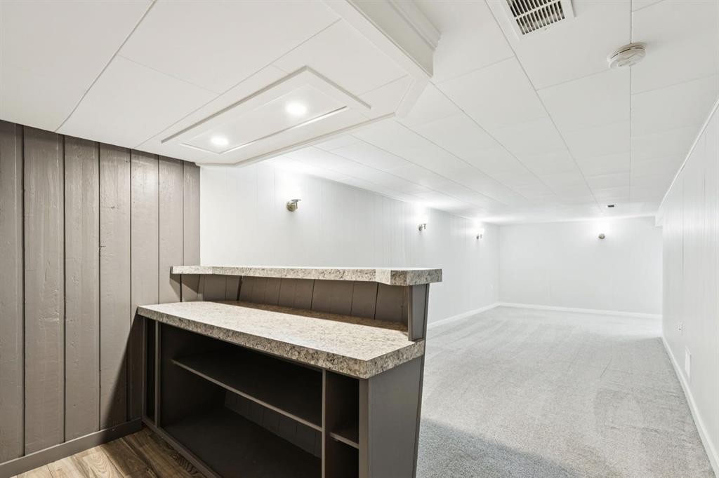48 Haddock Road Sw, Calgary, AB - Indoor Photo Showing Other Room
