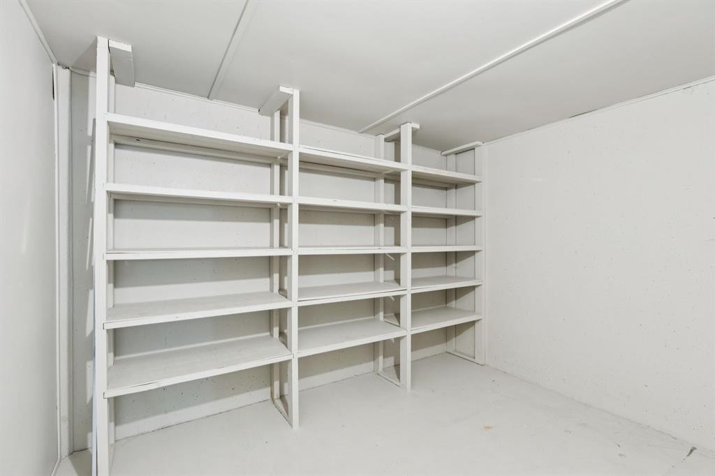 48 Haddock Road Sw, Calgary, AB - Indoor With Storage
