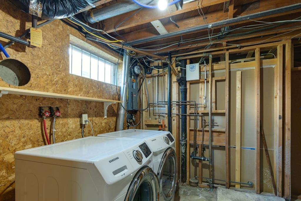 48 Haddock Road Sw, Calgary, AB - Indoor Photo Showing Laundry Room