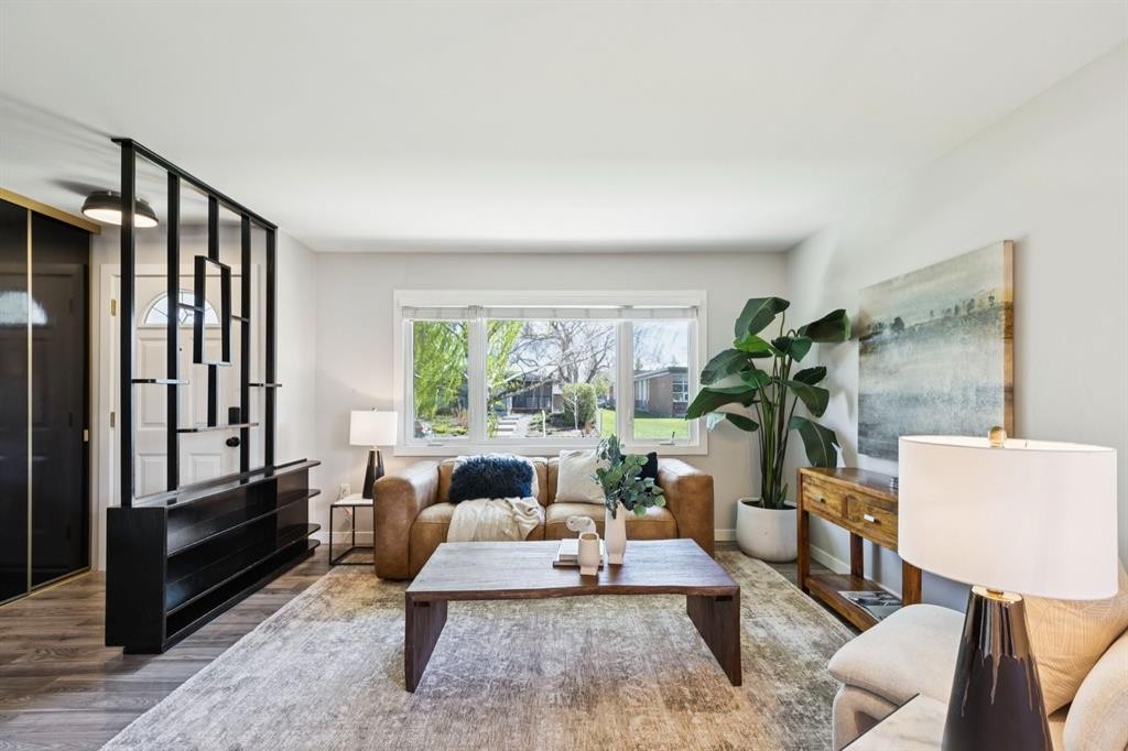 48 Haddock Road Sw, Calgary, AB - Indoor Photo Showing Living Room