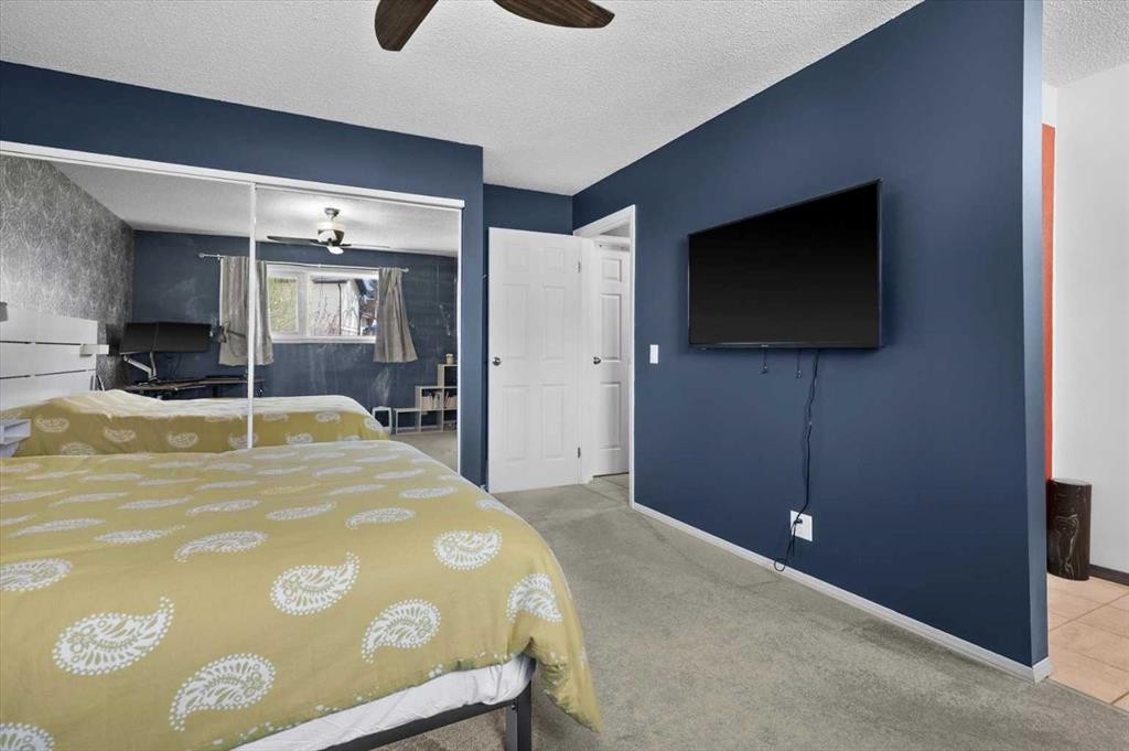 740 Canfield Place Sw, Calgary, AB - Indoor Photo Showing Bedroom