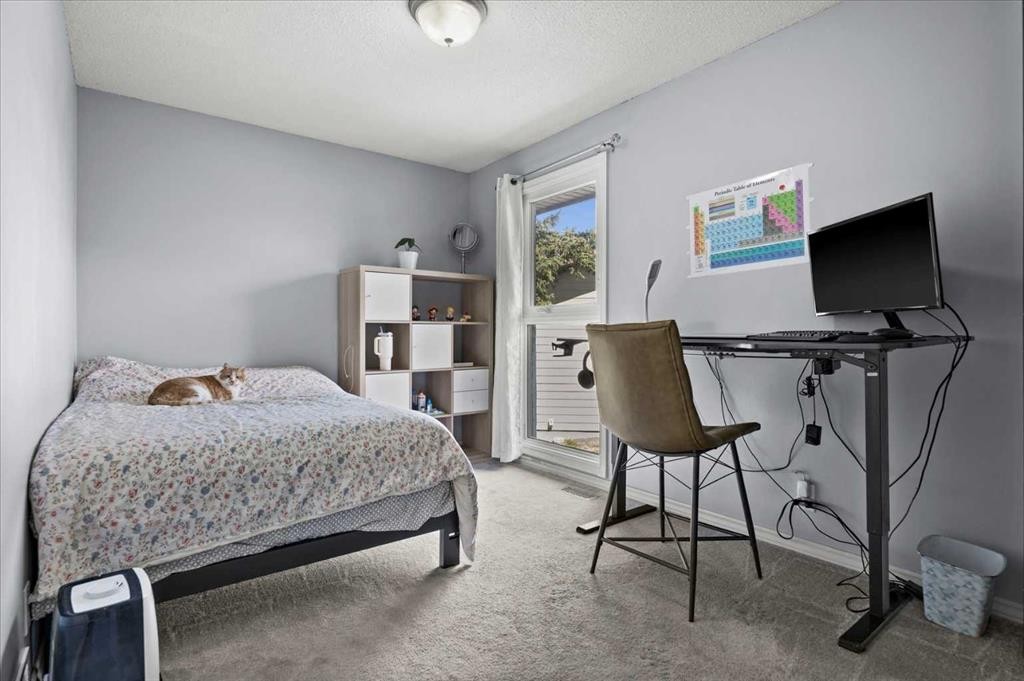740 Canfield Place Sw, Calgary, AB - Indoor Photo Showing Bedroom