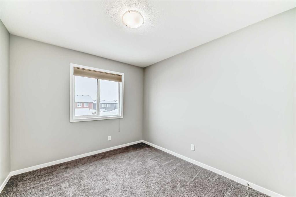 148 Howse Avenue Ne, Calgary, AB - Indoor Photo Showing Other Room