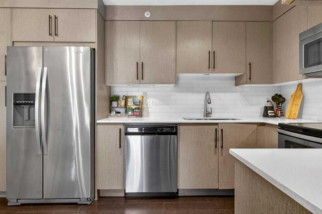 4403-302 Skyview Ranch Drive Ne, Calgary, AB - Indoor Photo Showing Kitchen With Stainless Steel Kitchen With Double Sink With Upgraded Kitchen