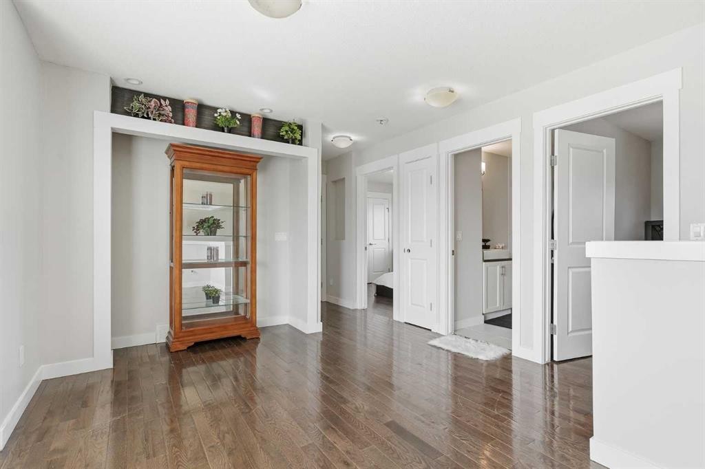 161 Rainbow Falls Glen, Chestermere, AB - Indoor Photo Showing Other Room