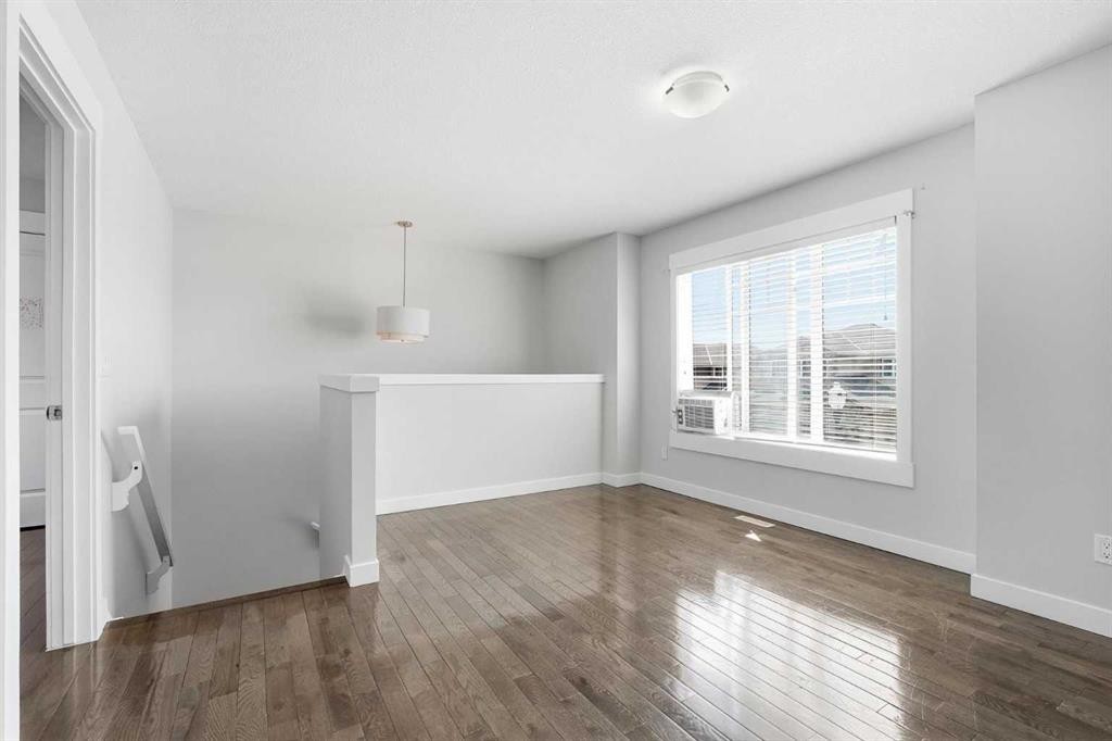 161 Rainbow Falls Glen, Chestermere, AB - Indoor Photo Showing Other Room