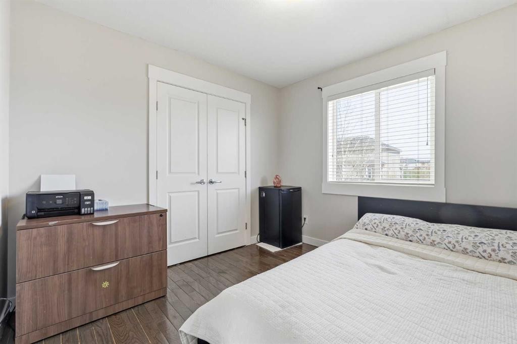 161 Rainbow Falls Glen, Chestermere, AB - Indoor Photo Showing Bedroom