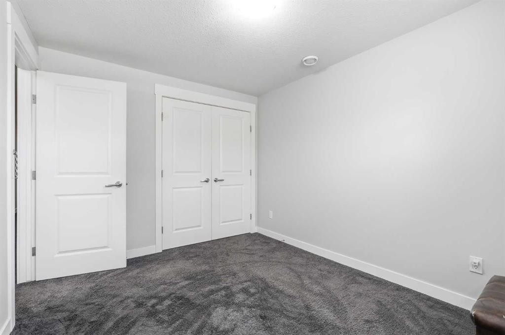 161 Rainbow Falls Glen, Chestermere, AB - Indoor Photo Showing Other Room