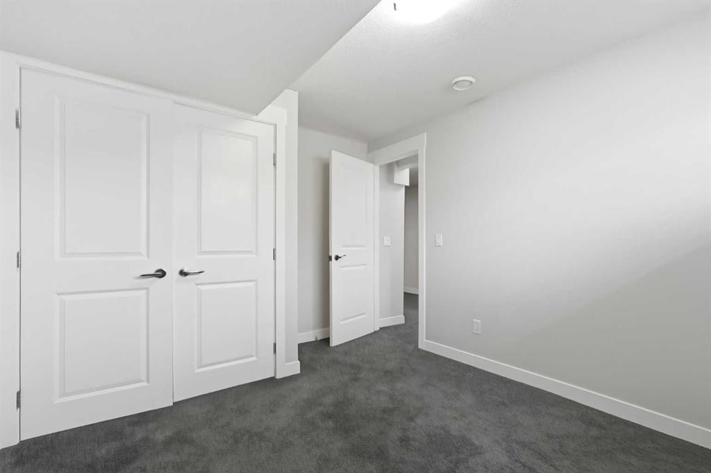 161 Rainbow Falls Glen, Chestermere, AB - Indoor Photo Showing Other Room