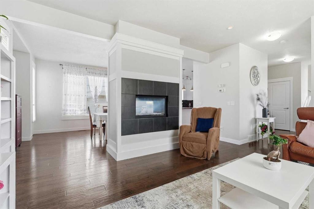 161 Rainbow Falls Glen, Chestermere, AB - Indoor Photo Showing Living Room With Fireplace