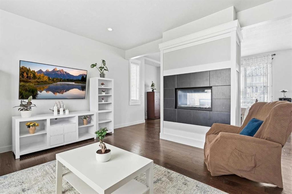 161 Rainbow Falls Glen, Chestermere, AB - Indoor Photo Showing Living Room With Fireplace