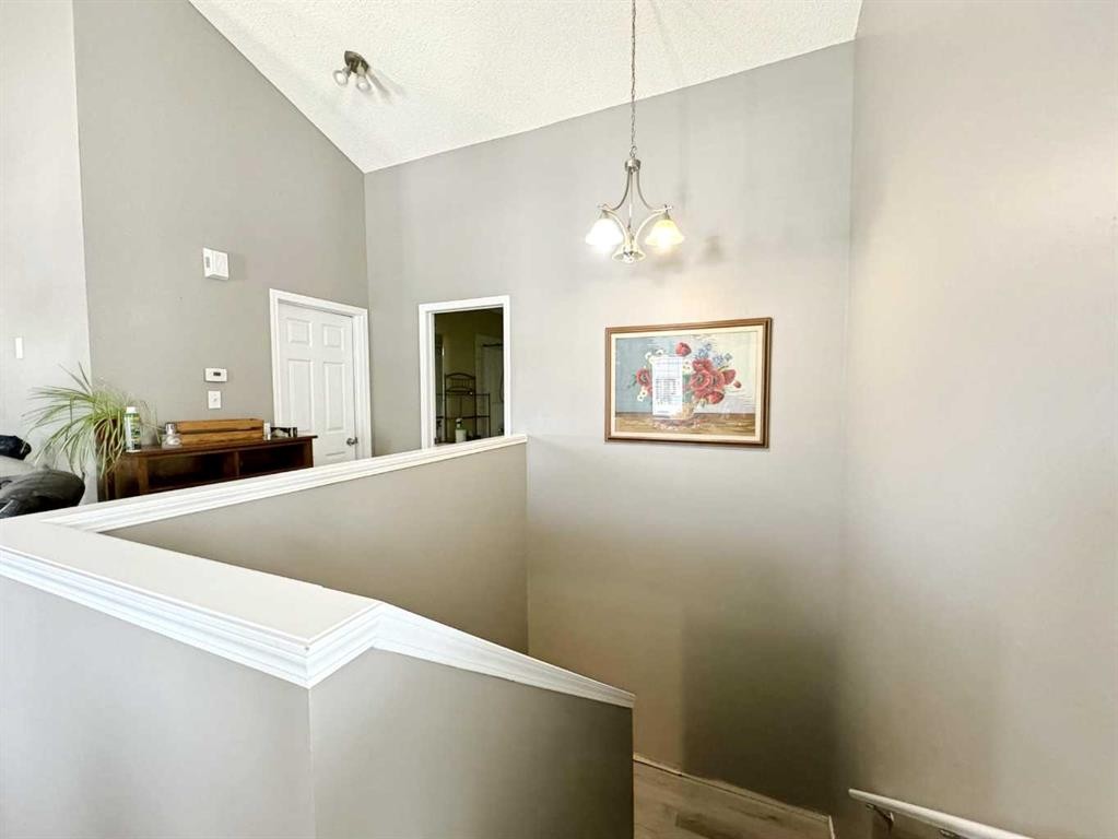 101 Channelside Cove Sw, Airdrie, AB - Indoor Photo Showing Other Room