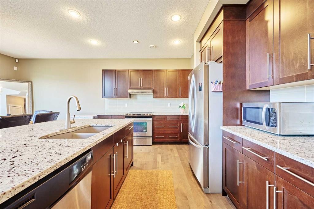 109 Sherwood Road Nw, Calgary, AB - Indoor Photo Showing Kitchen With Double Sink With Upgraded Kitchen