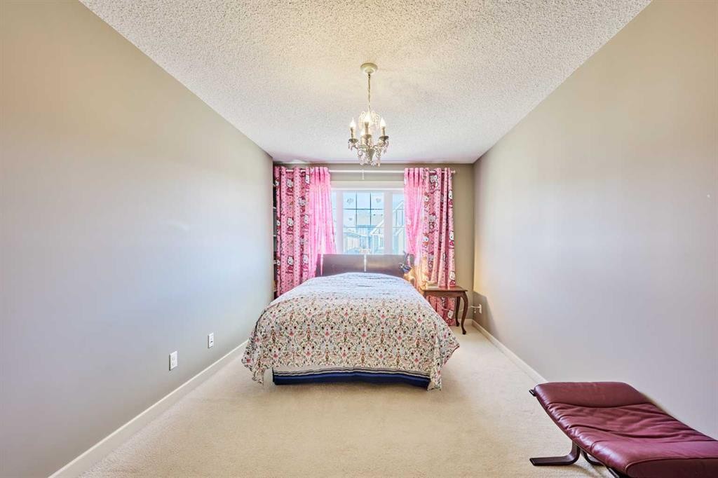 109 Sherwood Road Nw, Calgary, AB - Indoor Photo Showing Bedroom