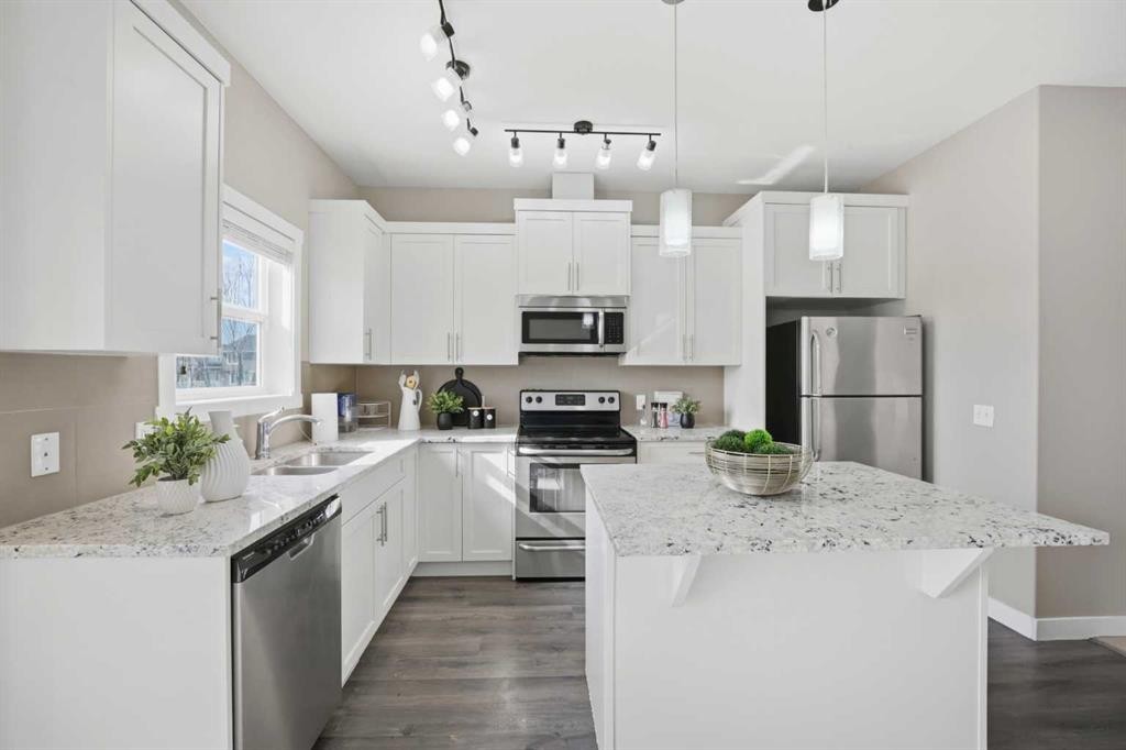 556 Redstone View Ne, Calgary, AB - Indoor Photo Showing Kitchen With Stainless Steel Kitchen With Double Sink With Upgraded Kitchen