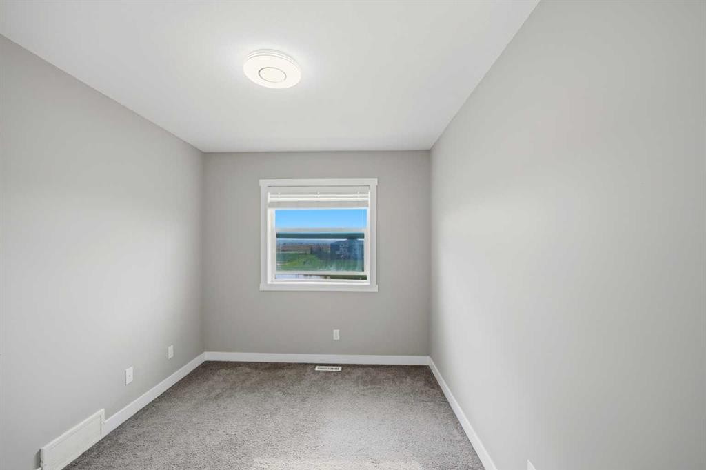 556 Redstone View Ne, Calgary, AB - Indoor Photo Showing Other Room