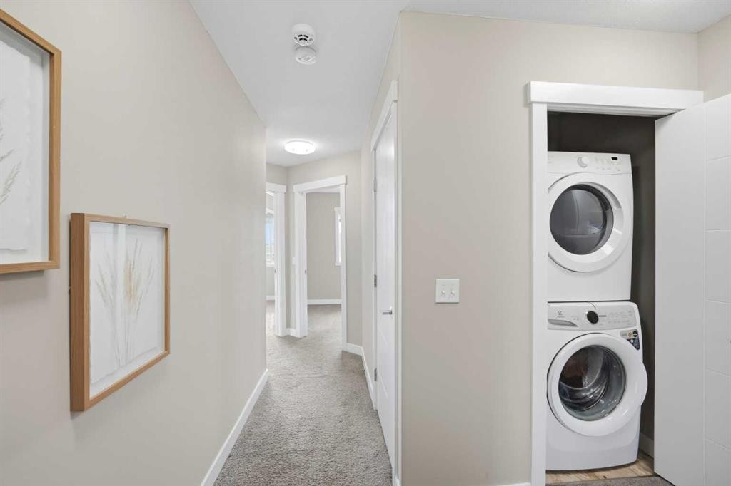 556 Redstone View Ne, Calgary, AB - Indoor Photo Showing Laundry Room